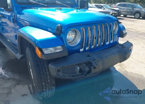 2022 Jeep Wrangler Unlimited Sahara 4X4 из США, поврежденный, VIN 1C4HJXEG9NW247956